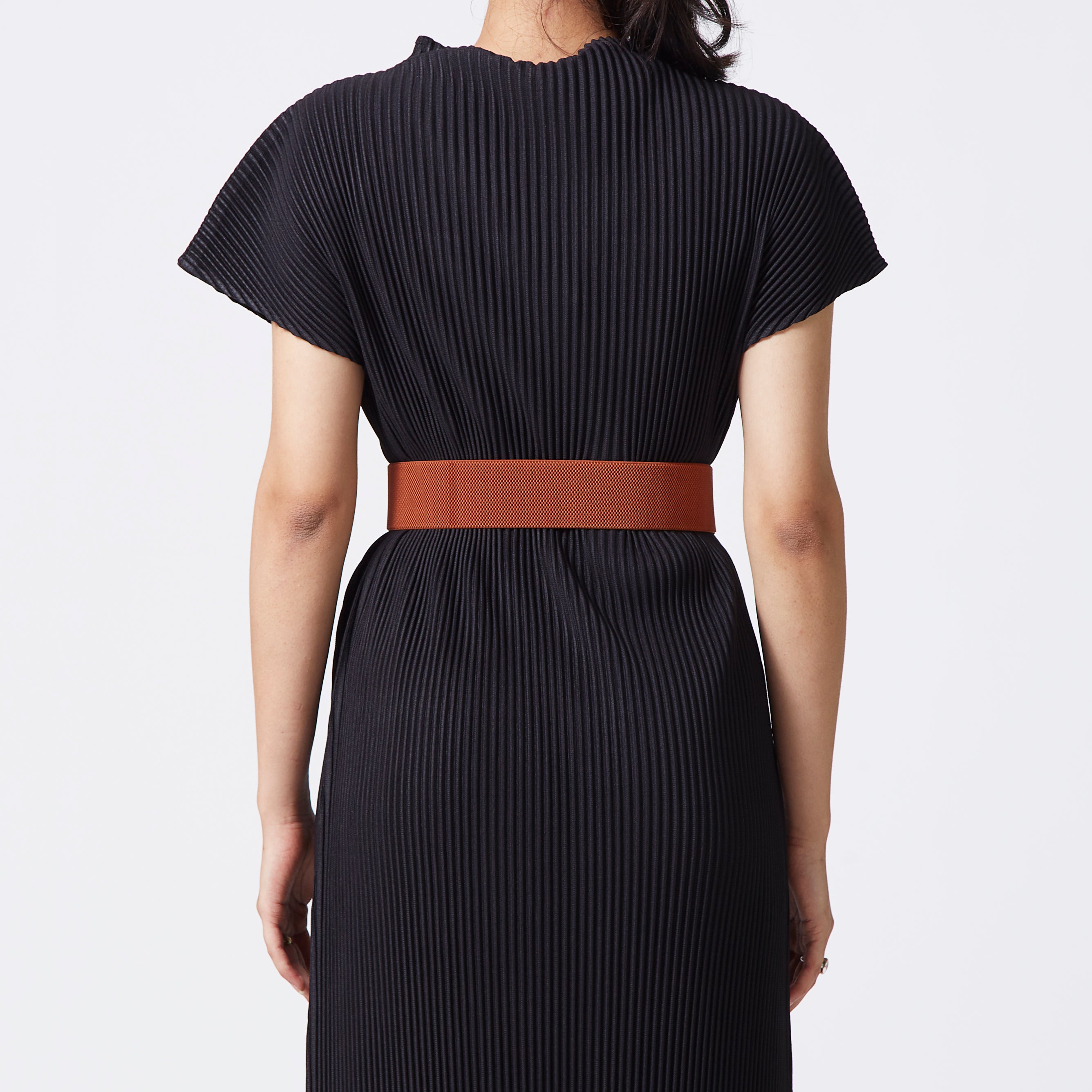 Tan elastic-backed faux leather belt with gold buckle
 Tan elastic-backed faux leather belt with gold buckle