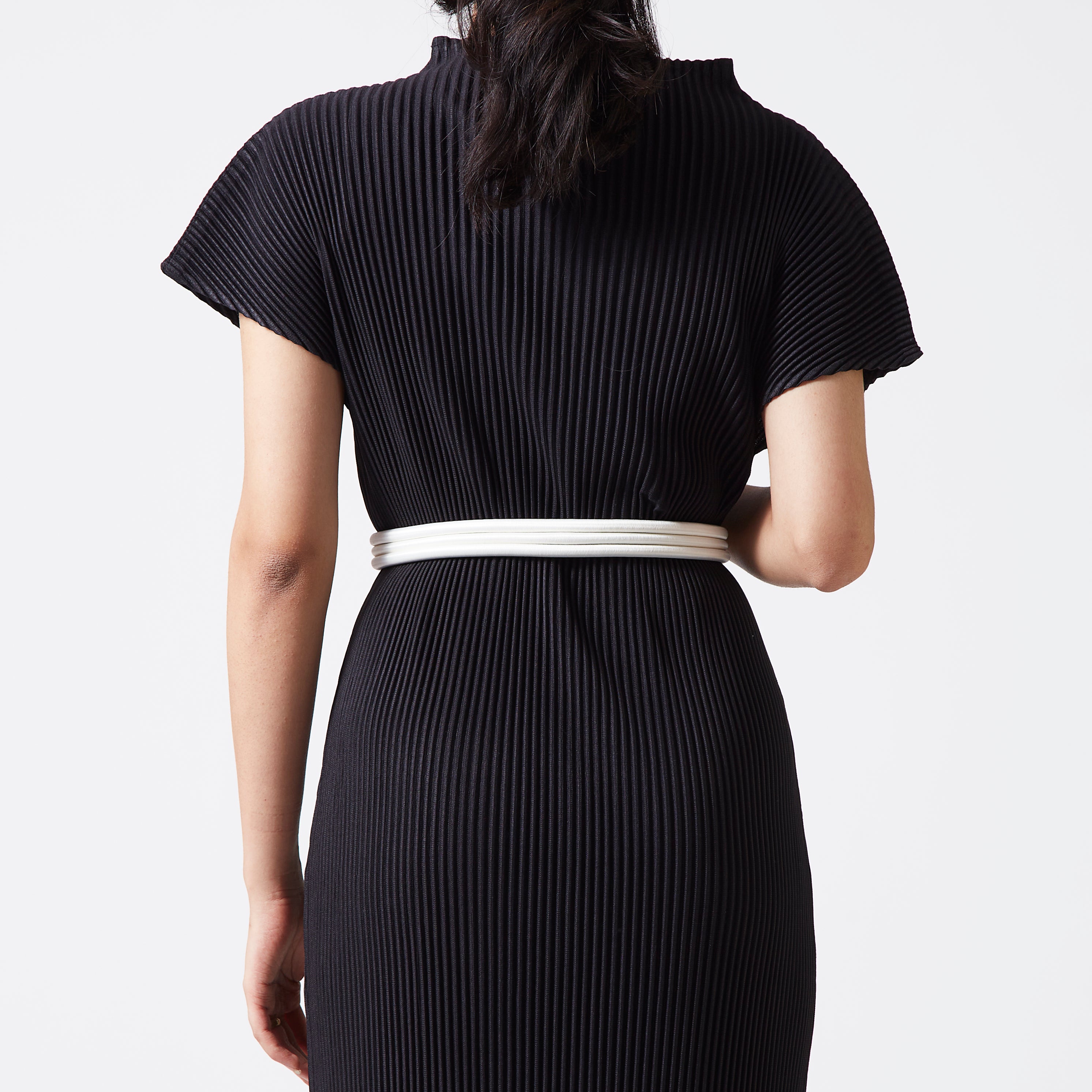 Artistic shot of Gold/Off White Cord Belt.
 Artistic shot of Gold/Off White Cord Belt.